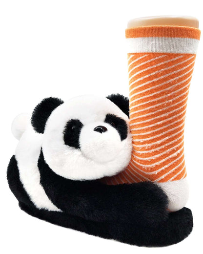 Panda slippers holding feet